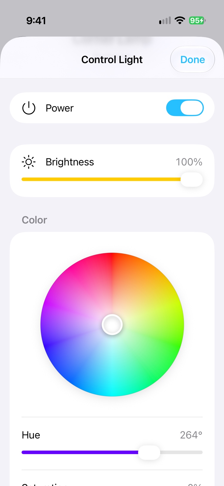 The light control for the Corner Lamp: a power switch, a brightness slider at 100 percent and a colour wheel.
